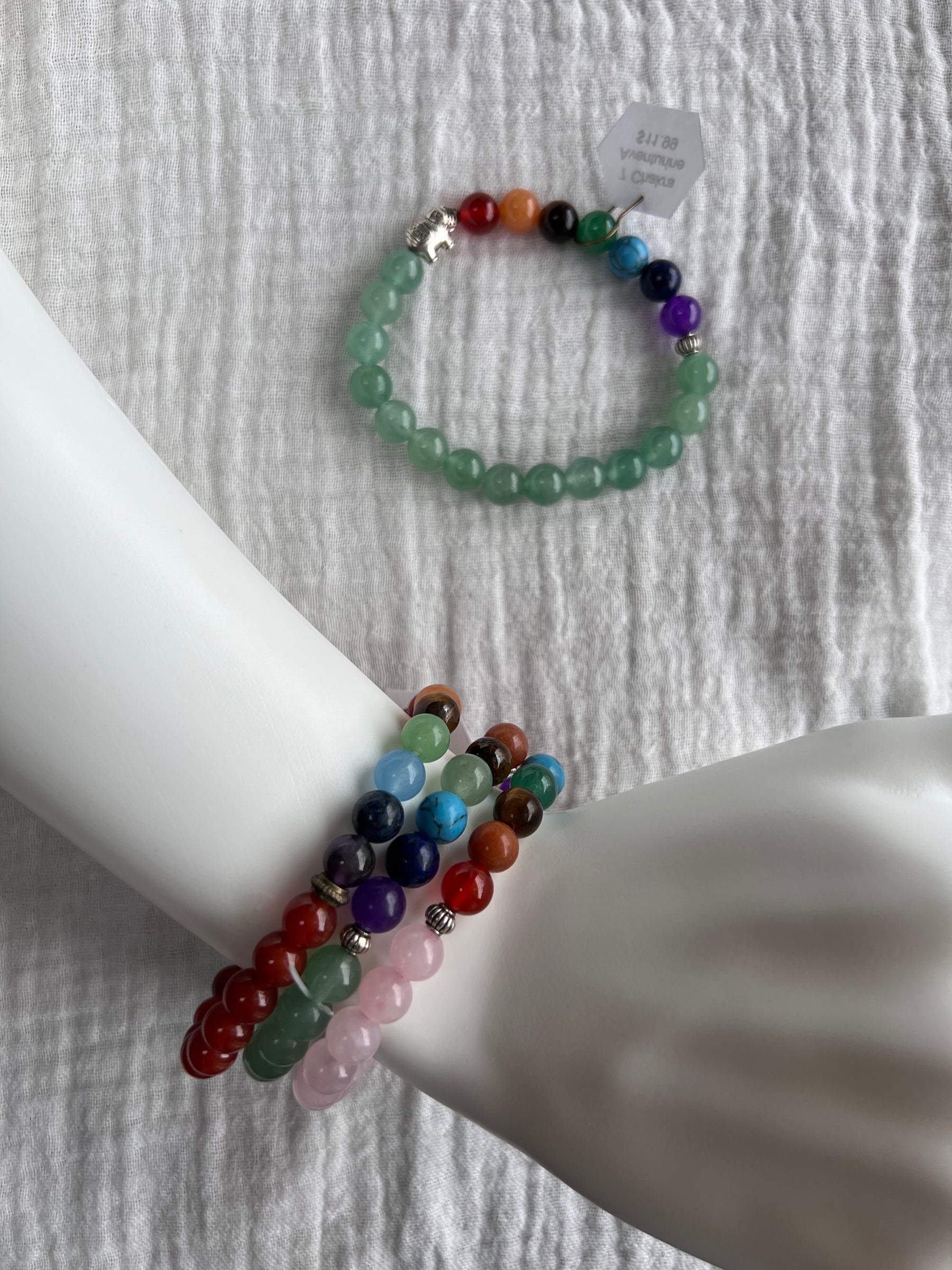 Rose quartz, Aventurine, Carnelian - 7 Chakras bracelets on wrist