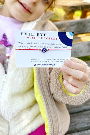 Evil eye wish bracelet with red cord from Evileyefavor