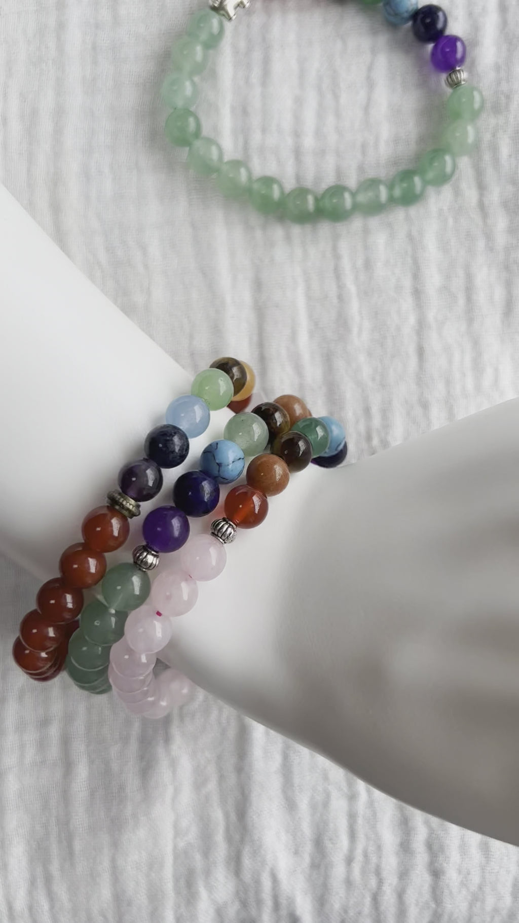 Rose quartz, Aventurine, Carnelian - 7 Chakras bracelets on wrist - video